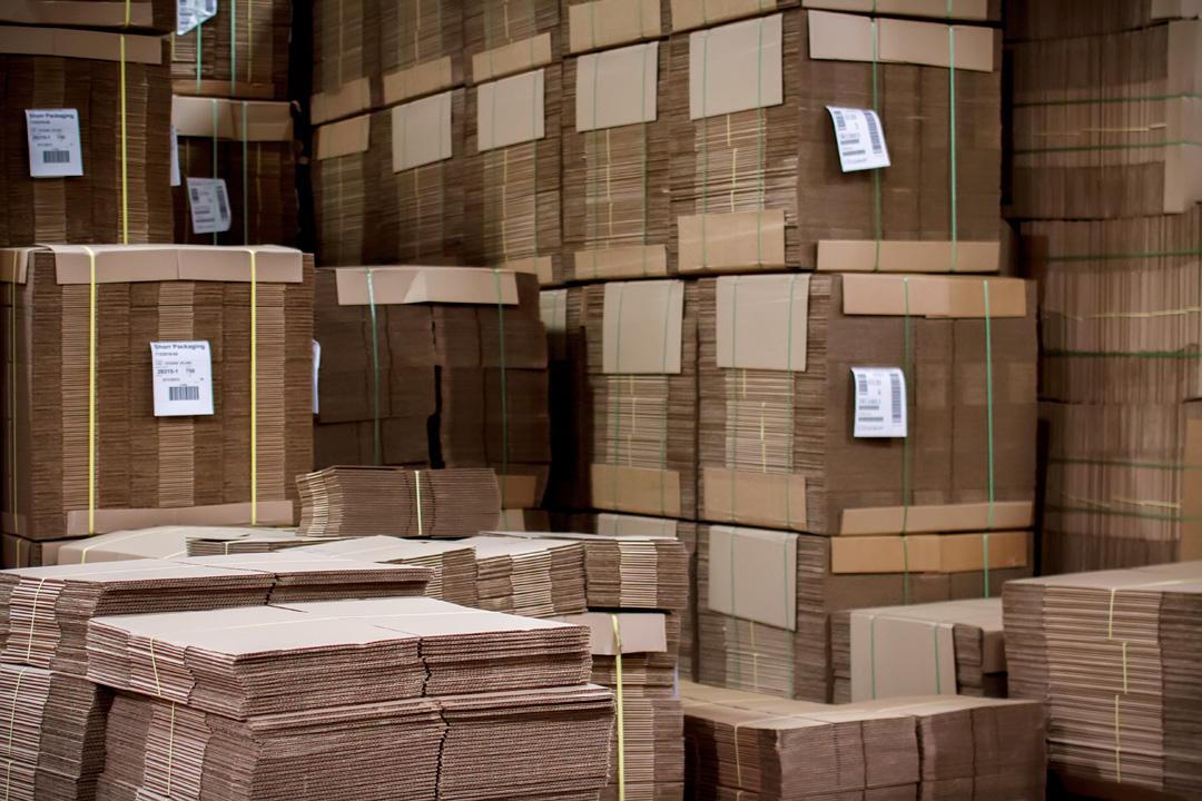 Corrugated bundles inside our paper and packaging warehouse near Cincinnati, OH